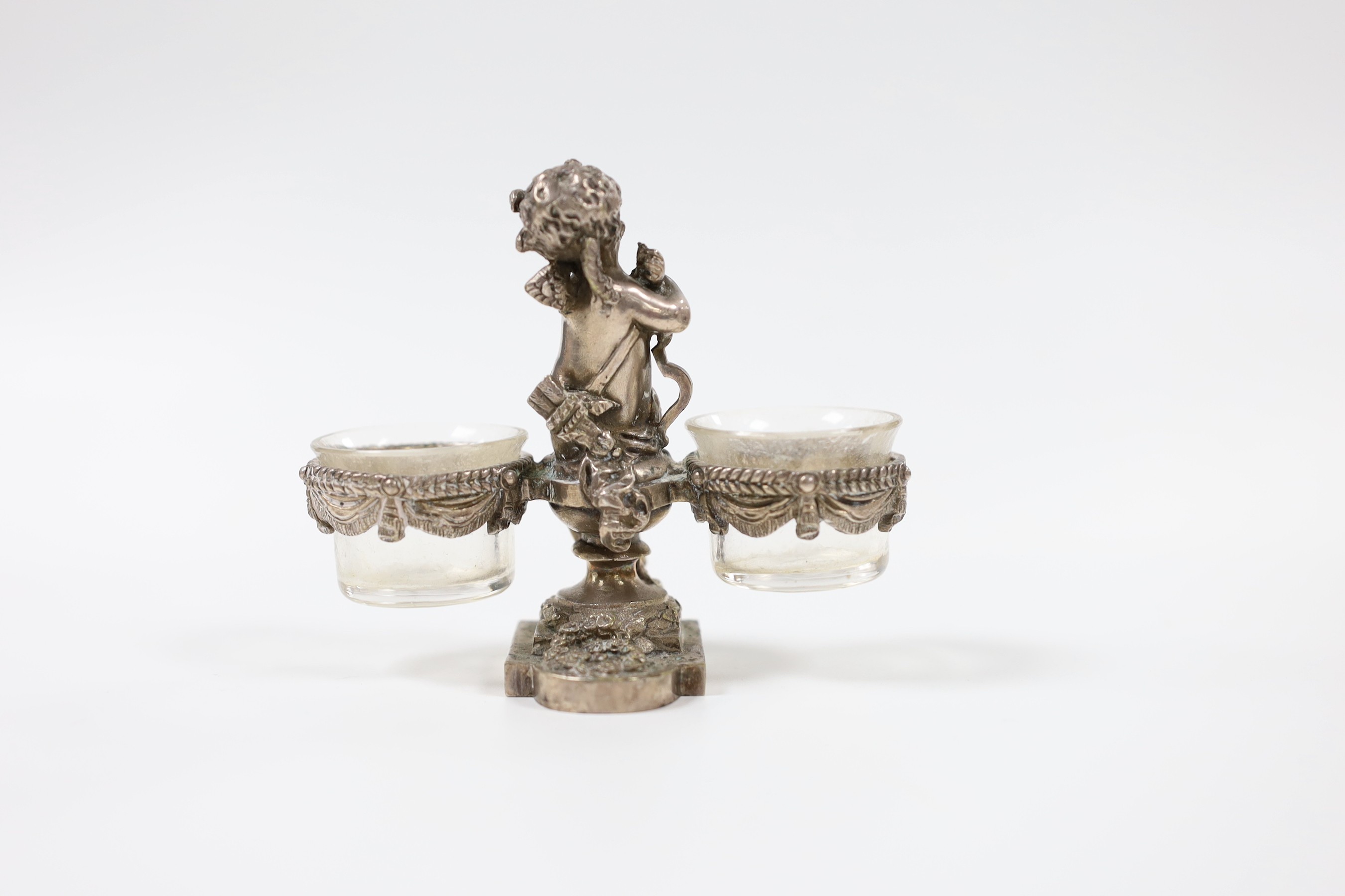 A Baccarat plated seated 'cherub' basket salt, 10cm tall